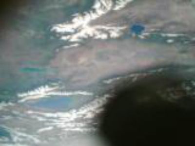 Imagen de la Tierra con la sombra de la sonda Langmuir.