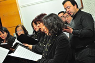 Intervención Musical del coro Schola Cantarum de la Facultad. 