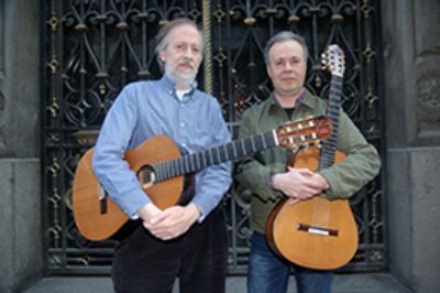 Los reconocidos músicos, Luis Orlandini y Romilio Orellana, presentarán el concierto "Encuentro Latinoamericano para dos guitarras" en San Joaquín.